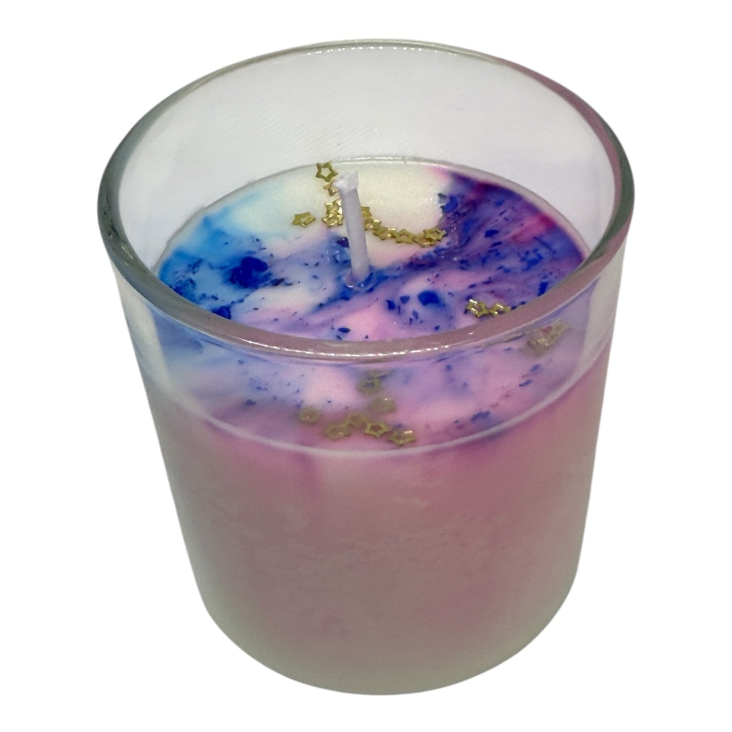 Luxe Milky Way Candle with purple, pink, and white swirls and gold constellation stars in a clear glass jar from KC Luxury CosmicLuxe Collection