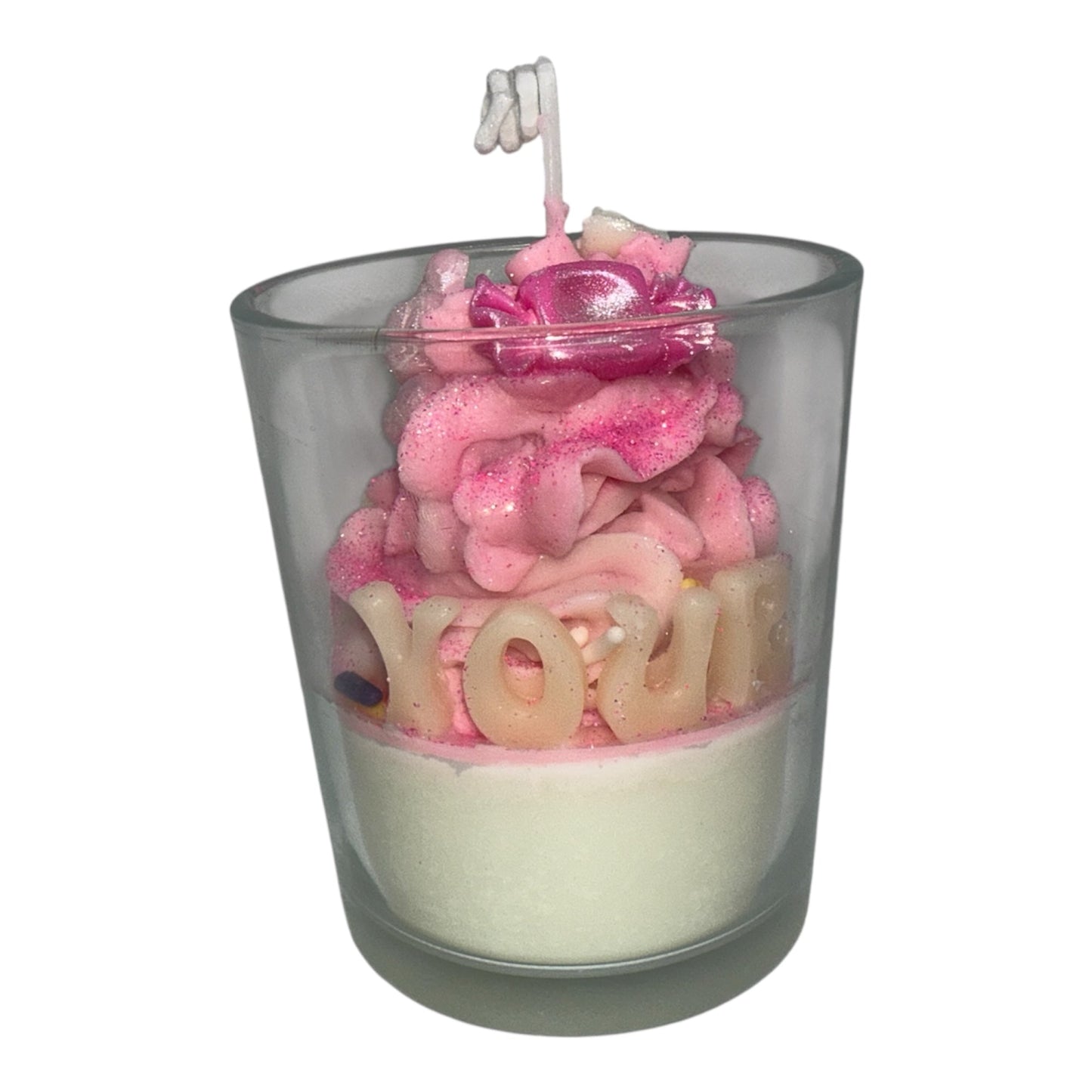 Personalized Luxe Name Glow Collection scented whipped candle with custom wax letters and pink swirls in a glass jar