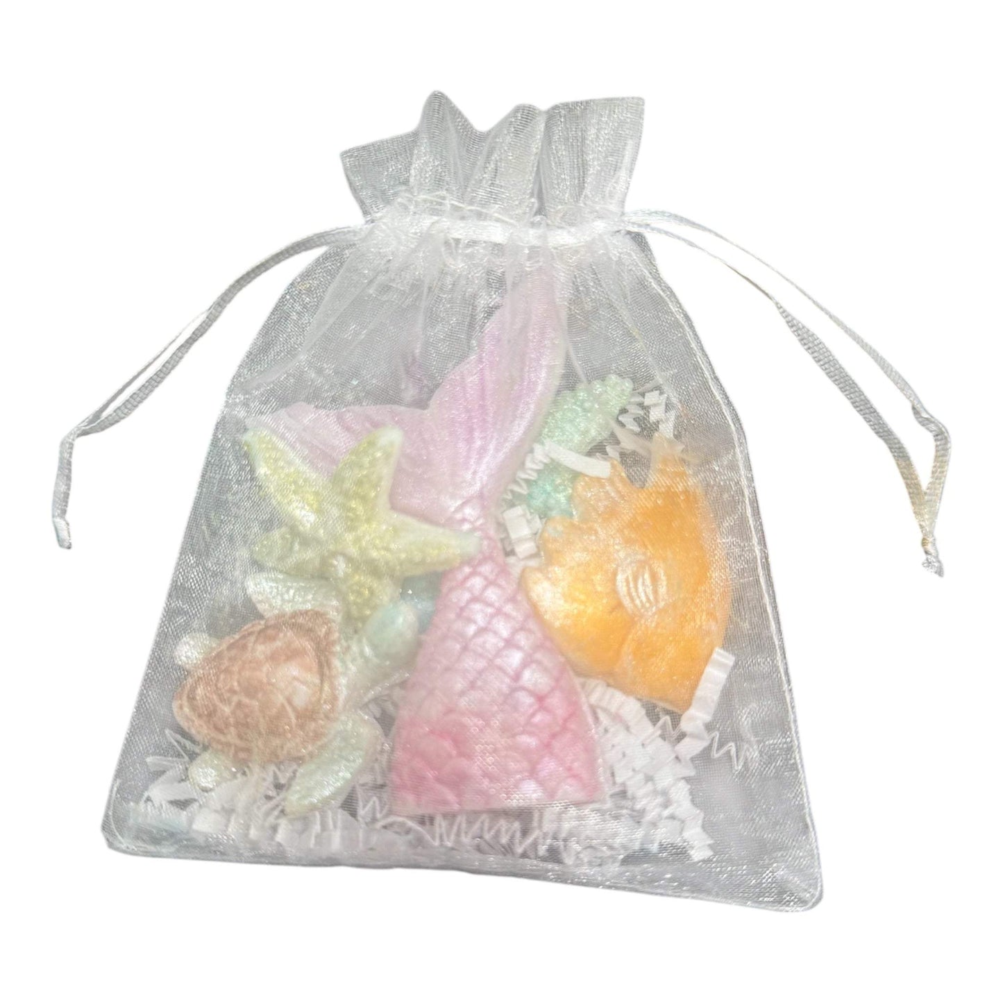 KC Luxe Wax Melts Collection in a decorative bag with assorted shaped artisan soy wax melts.