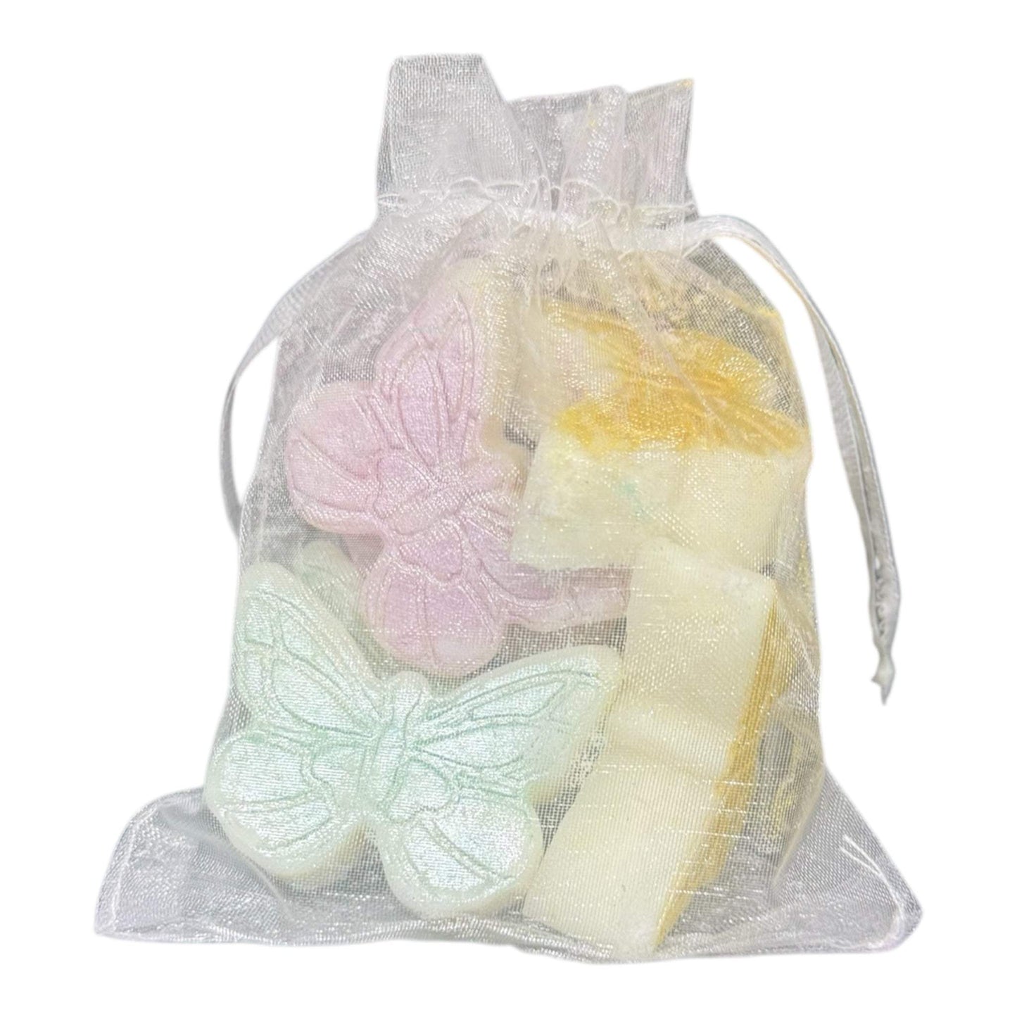 KC Luxe Wax Melts Collection in organza bag with butterfly shapes.