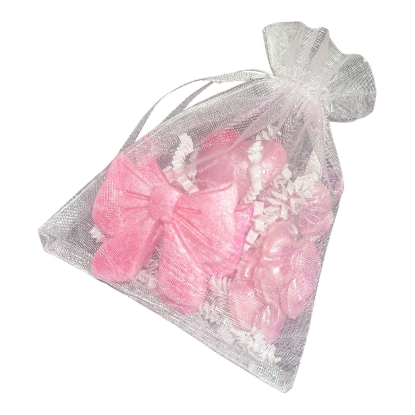 KC Luxe Wax Melts Collection in a sheer gift bag with pink butterfly-shaped melts.