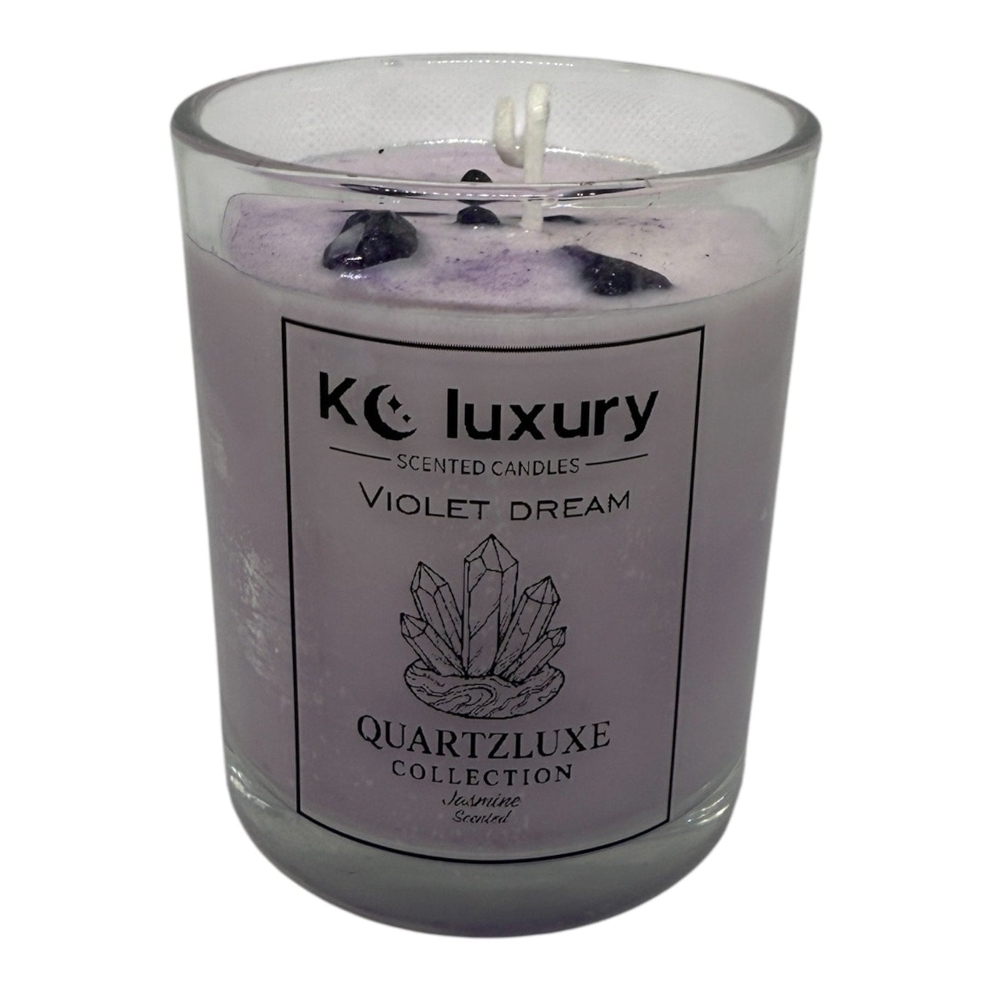 Violet Dream Candle from QuartzLuxe Collection with amethyst crystals and violet soy wax in a glass jar.