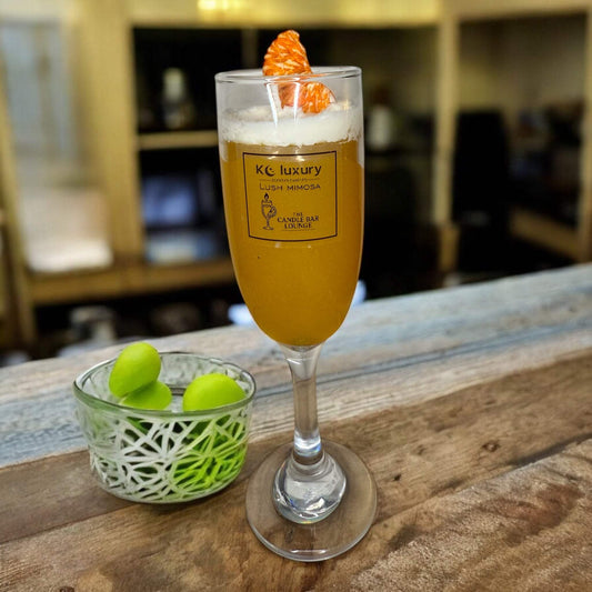 Lush Mimosa candle shaped like a mimosa drink by KC Luxury Candles.