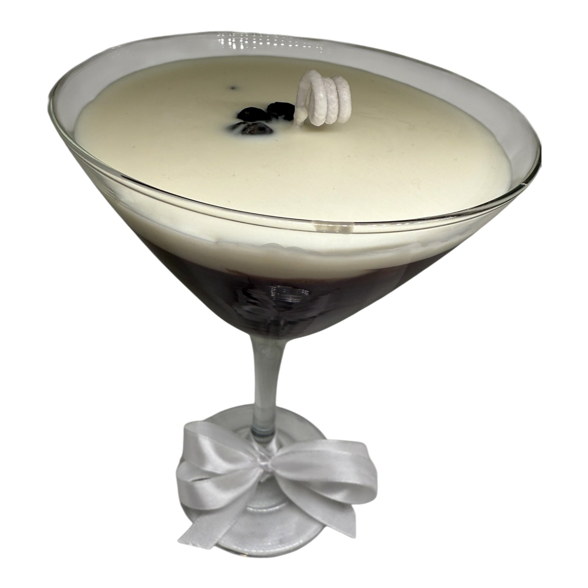 Espressotini Luxe Glow candle in martini glass shape with creamy top and elegant ribbon.