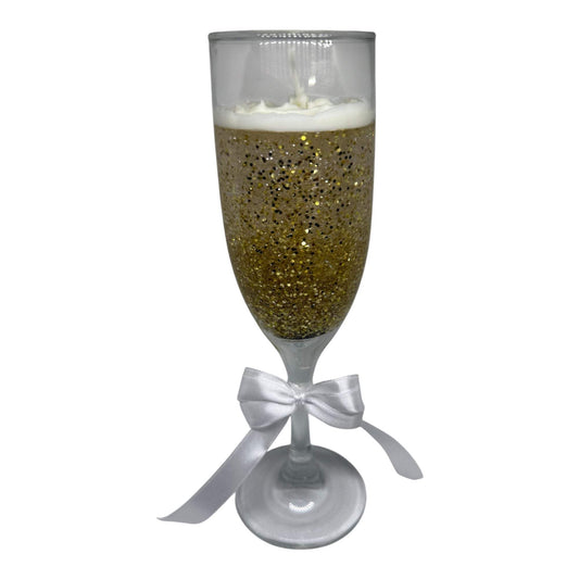 Custom Scented Sparkle Candle - Bubble Luxe Glow in champagne glass with a white bow.
