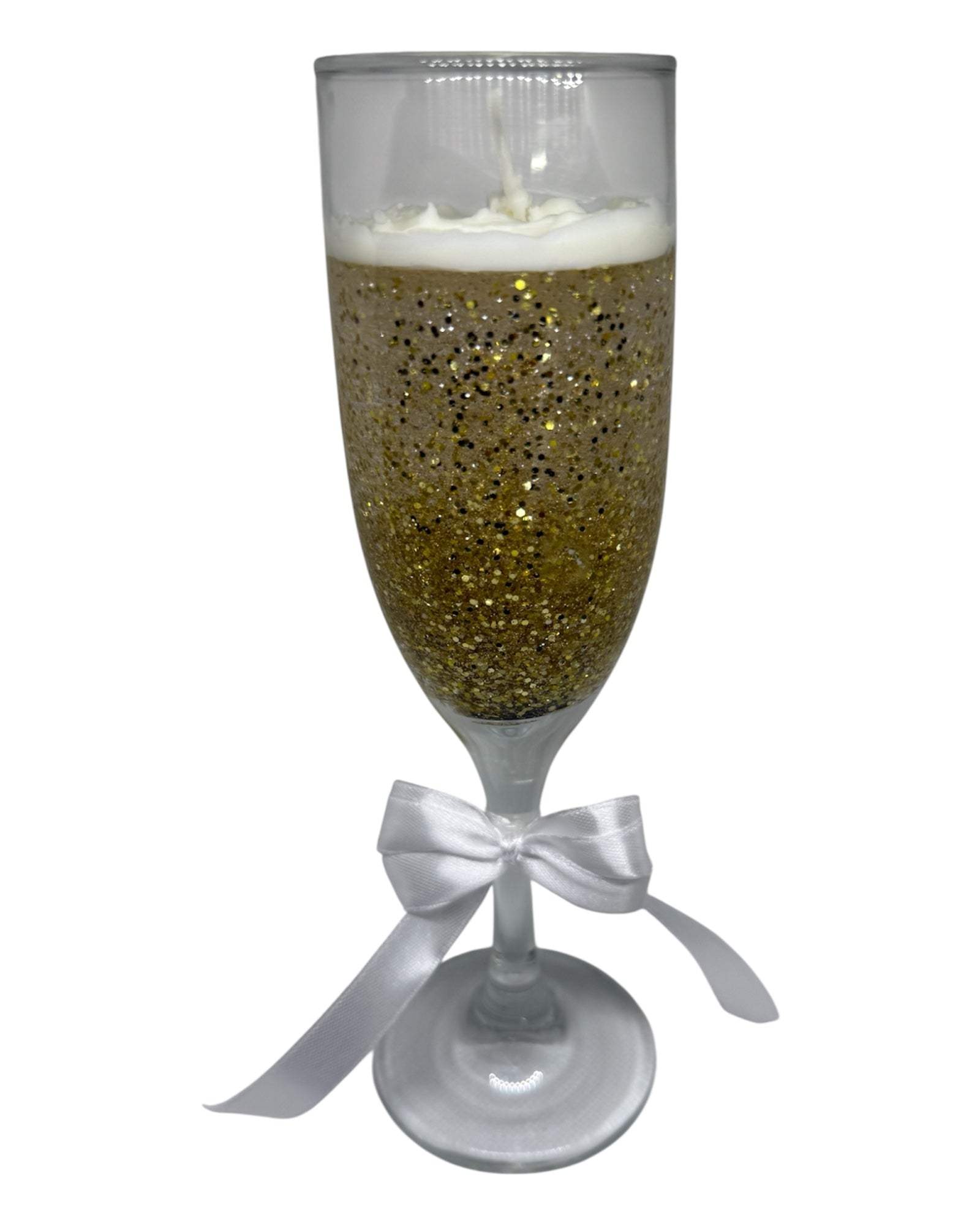 Bubble Luxe Glow custom scented sparkle candle in a champagne glass with a sparkly gold finish and white ribbon.