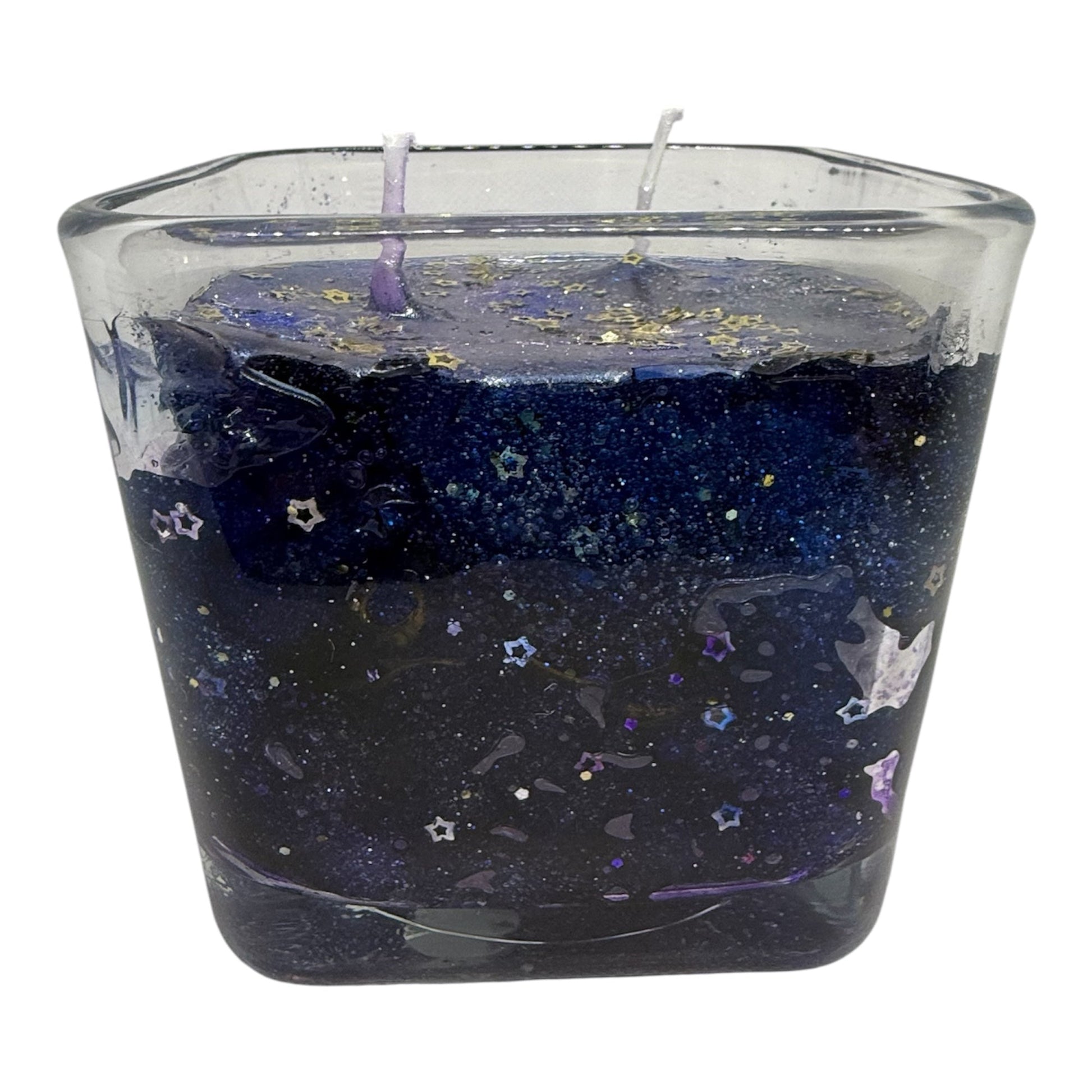 Galaxy-inspired jelly wax candle with cosmic swirls and star details by StarLuxe Dreams.