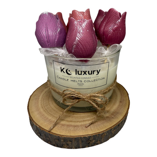 KC Luxury Tulip Bouquet Melt Collection with six purple tulip wax melts and hidden 12oz scented candle in glass jar on wooden base
