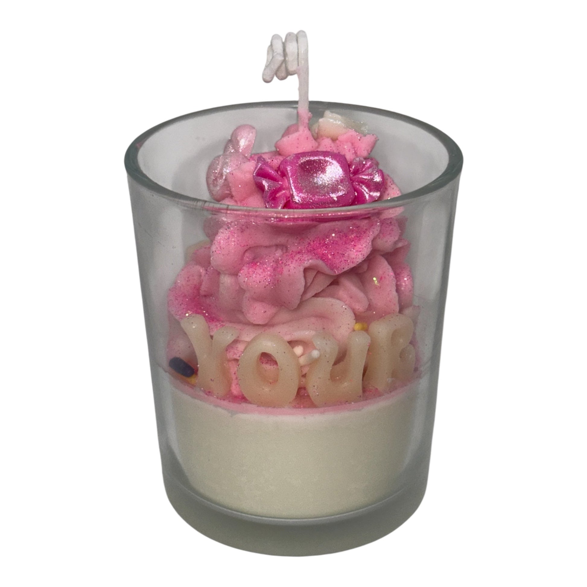 Personalized Luxe Name Glow Collection scented candle with pink whipped wax and custom wax letters in glass jar