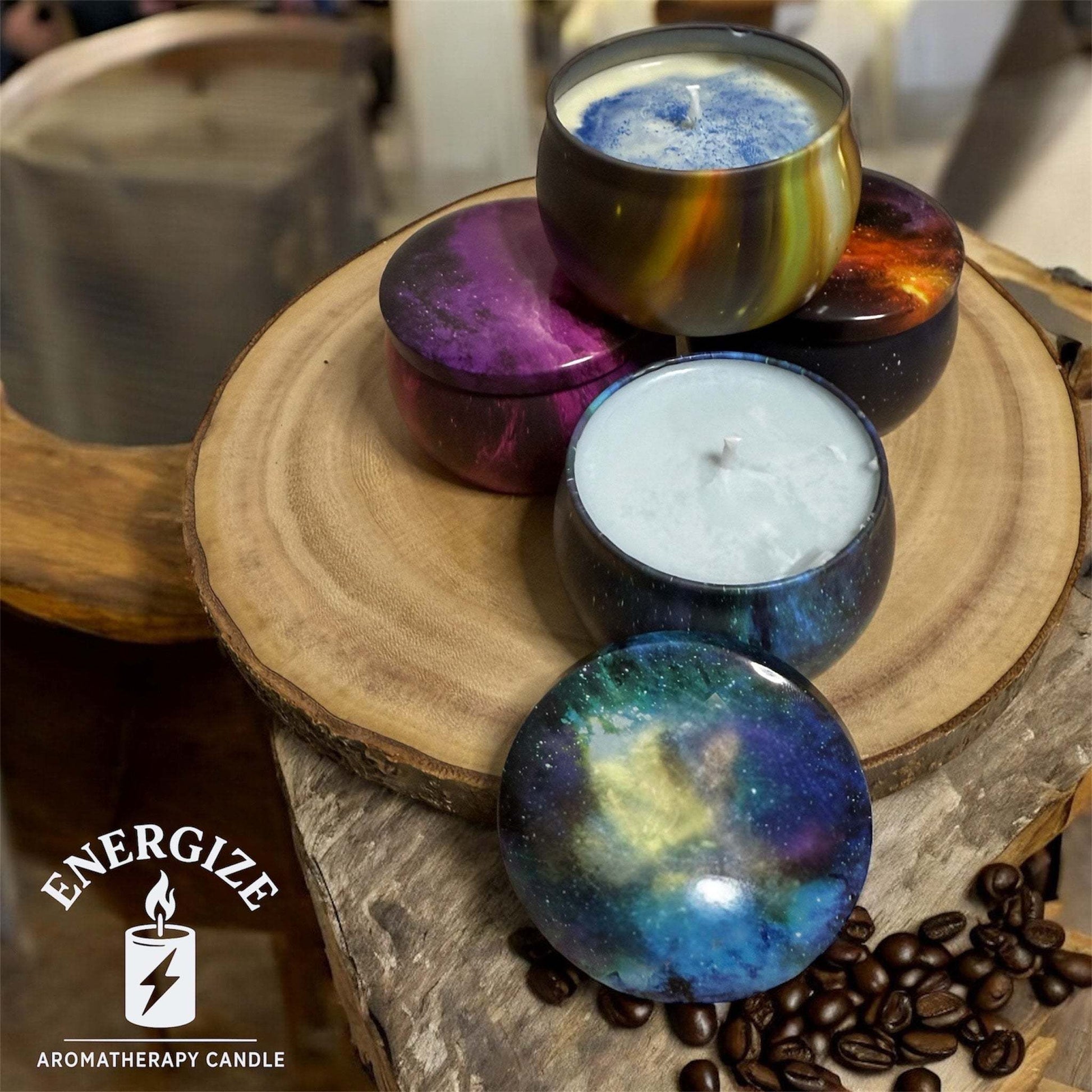 Aromatherapy soy candle with essential oils on a wooden surface, featuring colorful galaxy-inspired designs.