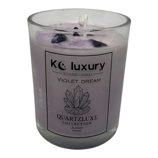 Violet Dream Candle from QuartzLuxe Collection with amethyst crystals and violet soy wax in a glass jar.