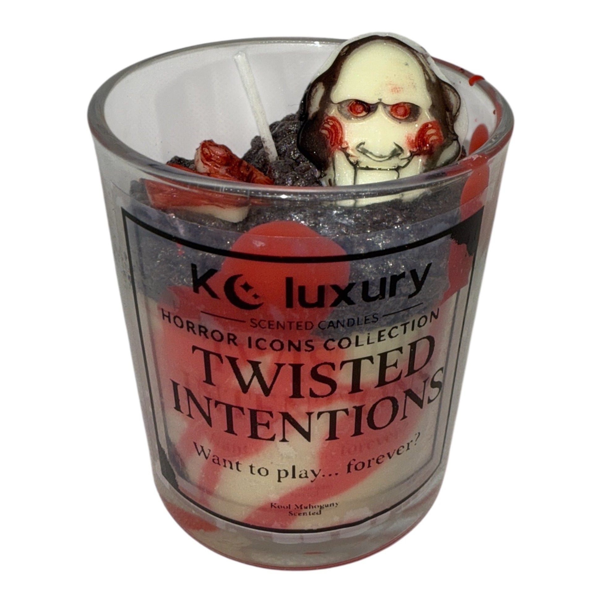 KC Luxury Horror Icons Candle Collection "Twisted Intentions" with Chucky-themed design, premium soy wax, and spooky red accents in clear glass container