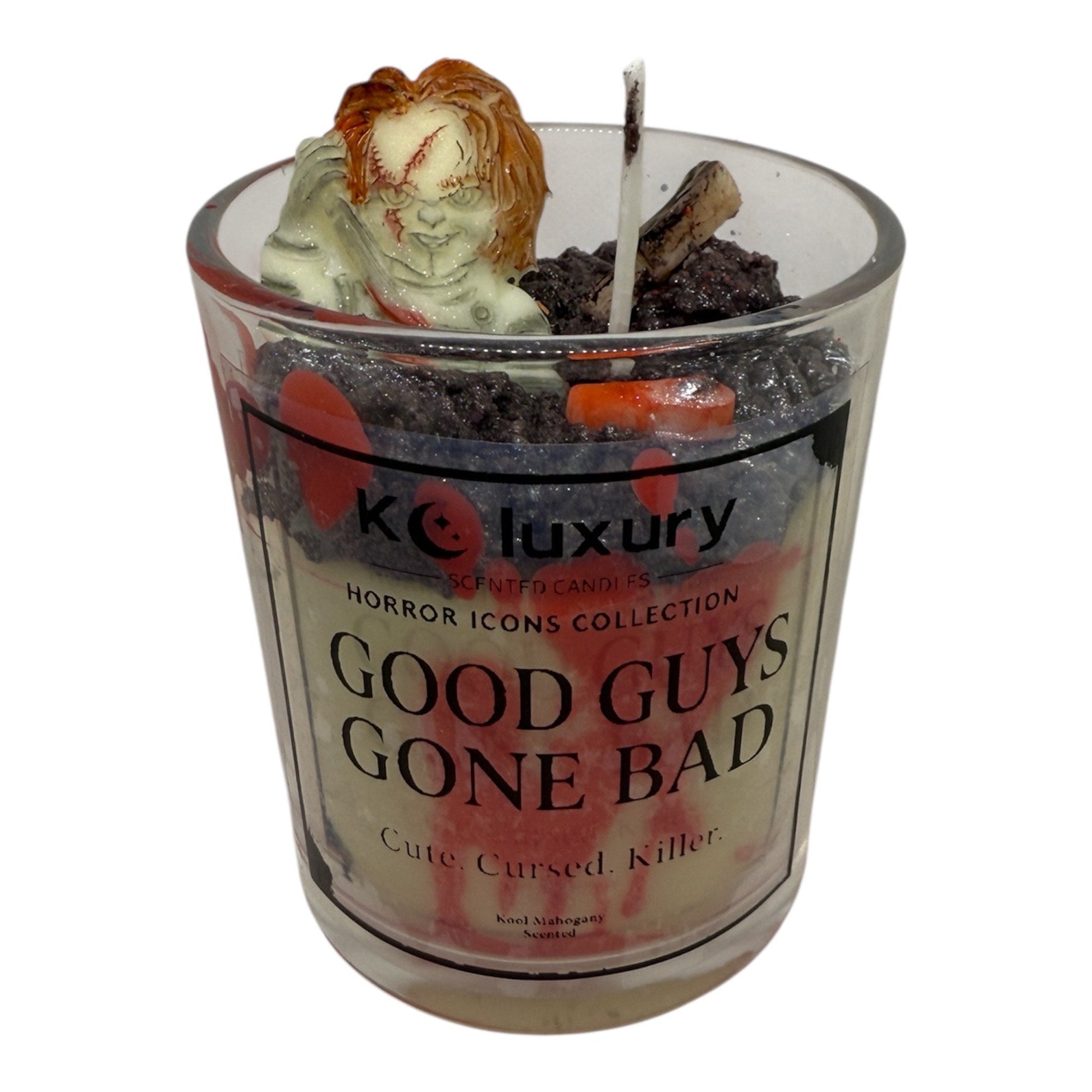 Horror Icons Candle Collection featuring Chucky-inspired luxury scented candle in glass jar with decorative details